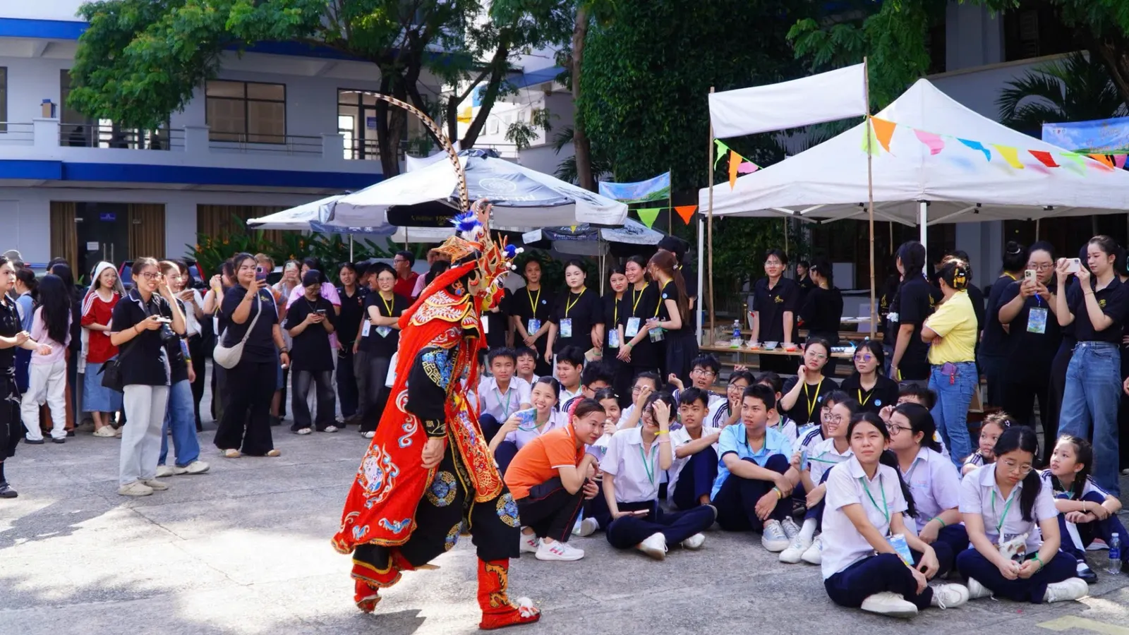 Children joyfully playing with students from the HCMC University of Culture